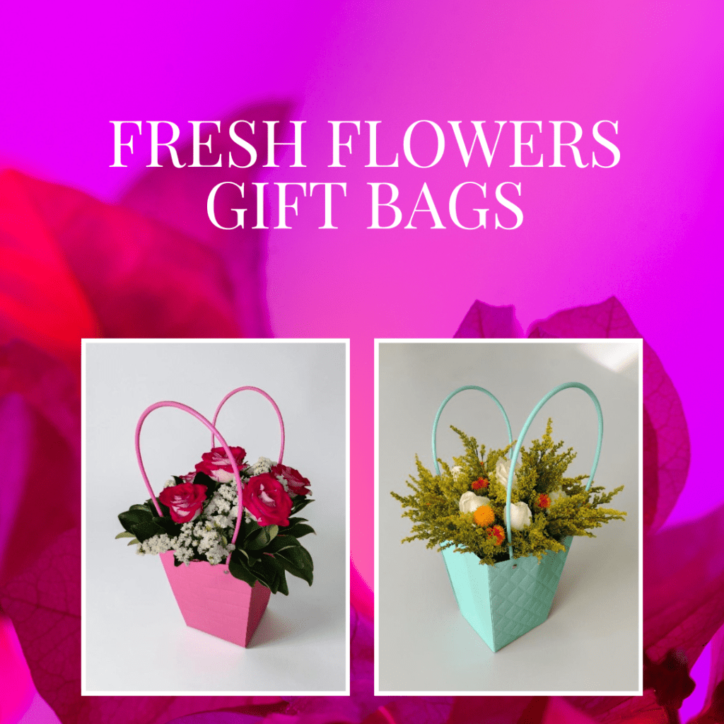 Hero image for a florist: pink gift bag with roses on the left and a turquoise bag with mixed blooms on the right against a bright pink background.